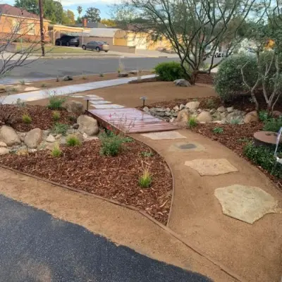 Native plant garden with mulched beds and drought-tolerant shrubs
